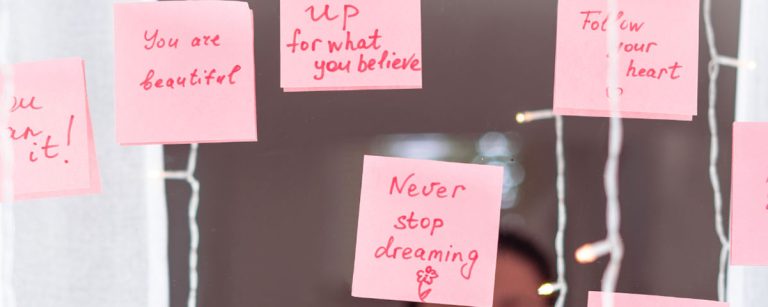 Person repeating positive affirmations during a calm morning routine